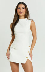 Sleeveless High Neck Faux Wrap Tulip Dress in Cream